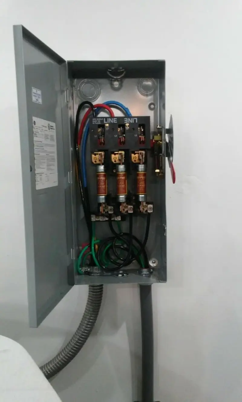 Three-phase disconnect switch installed for Smoke Detector Installation in Moreau