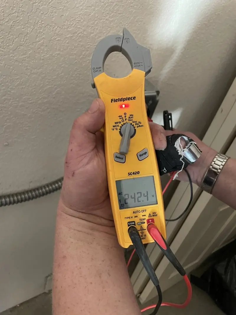 Voltage testing with clamp meter during Circuit Breaker Repair in Moreau